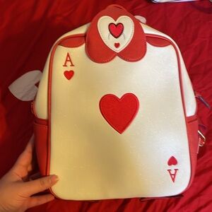 Red card of Alice in wonderland loungefly